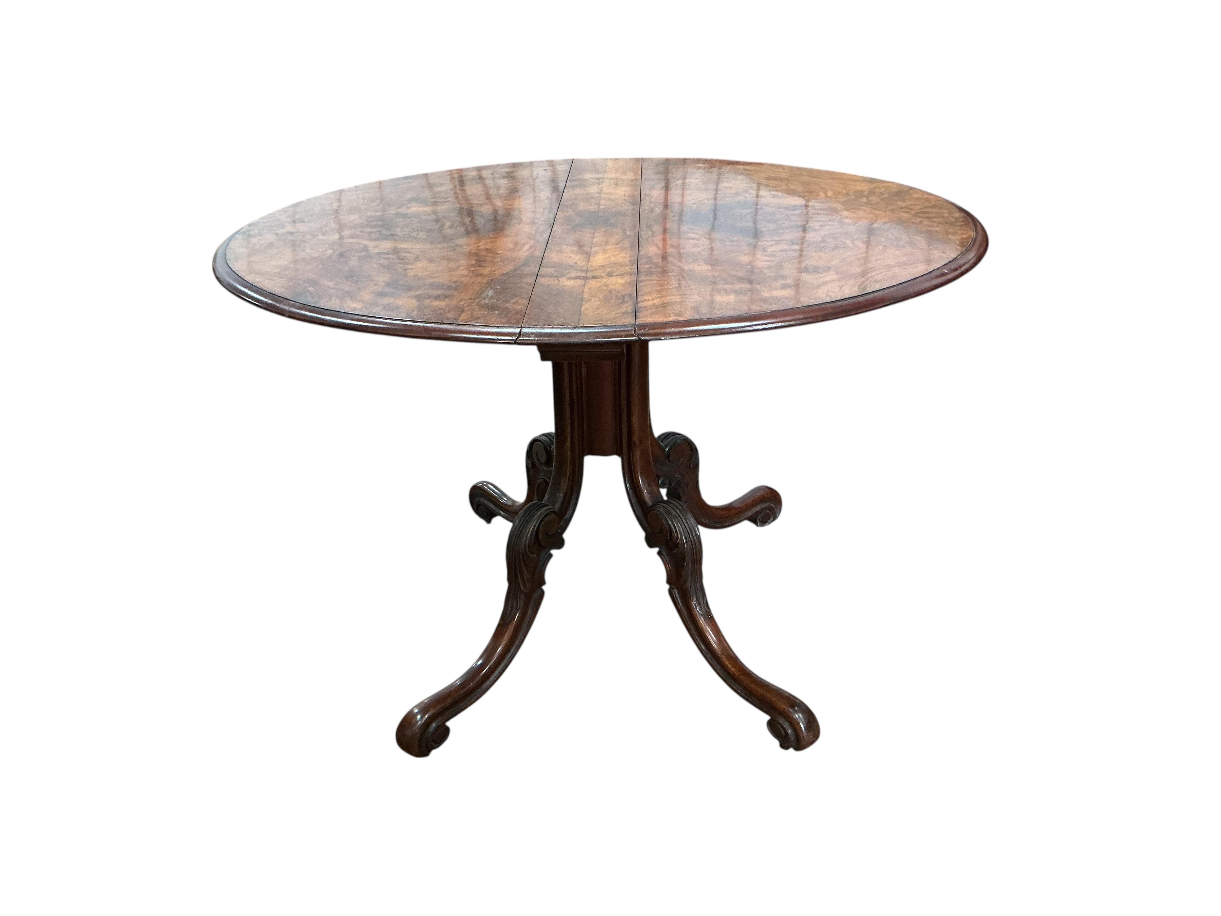 A Victorian burr walnut Sutherland table, width 91cm, height 73cm